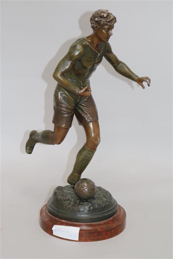 An early 20th century spelter model of a footballer 40cm.